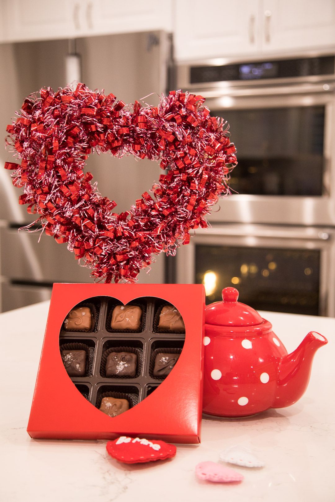 Valentine sea salt caramel box with a heart wreath and red teapot